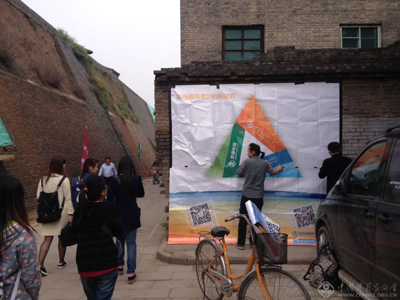 2014平遥摄影大展开幕 中国摄协三网“轻”影展遭哄抢